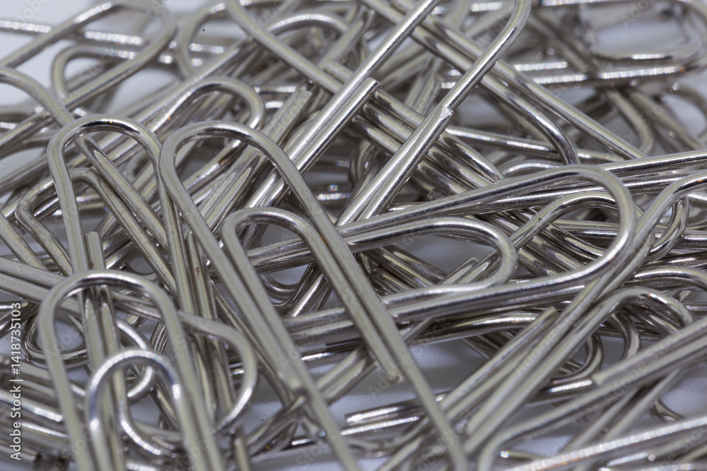 Organized paper clips office desk macro photography indoor workspace top-down view minimalist concept for efficient organization Organized paper clips office desk macro photography indoor workspace top-down view minimalist concept for efficient organization