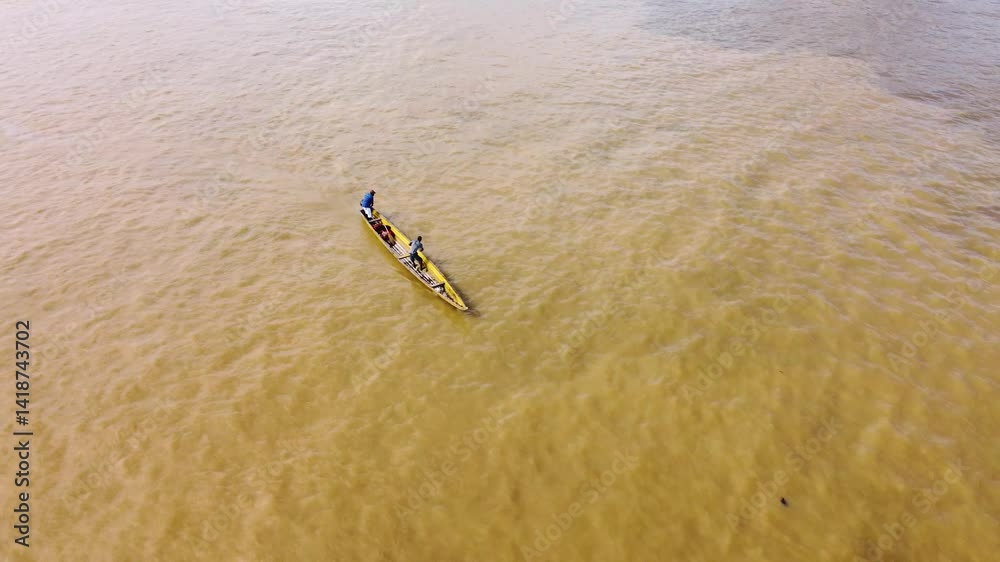 Aerial Majesty of Quibdó: River, Faith, and Rainforest. Drone views of Quibdó, Choco, Colombia, featuring the Atrato River, boats, rainforest, and the iconic cathedral. A vibrant mix of nature.
