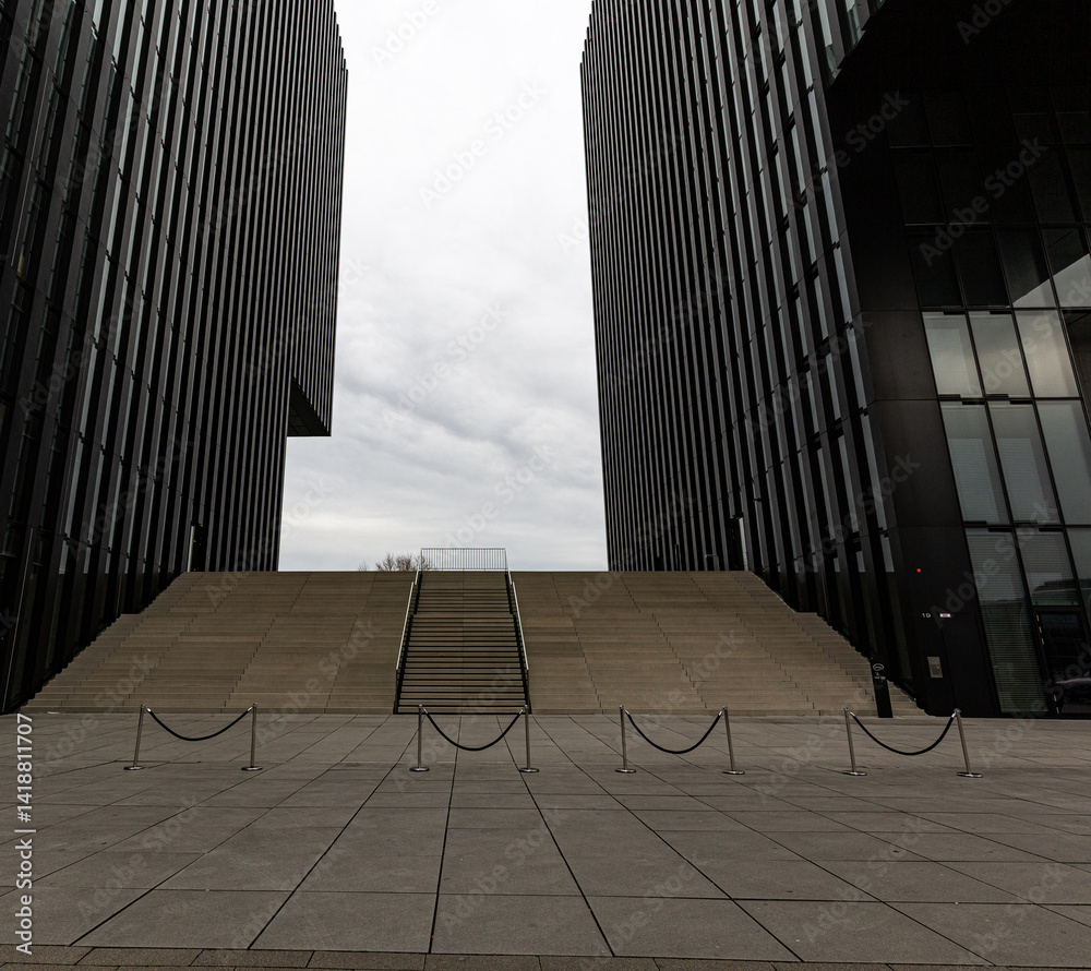 Stone steps between two tall buildings