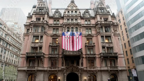Historic building facade with American flag, urban architecture, city skyline, cultural heritage, New York City