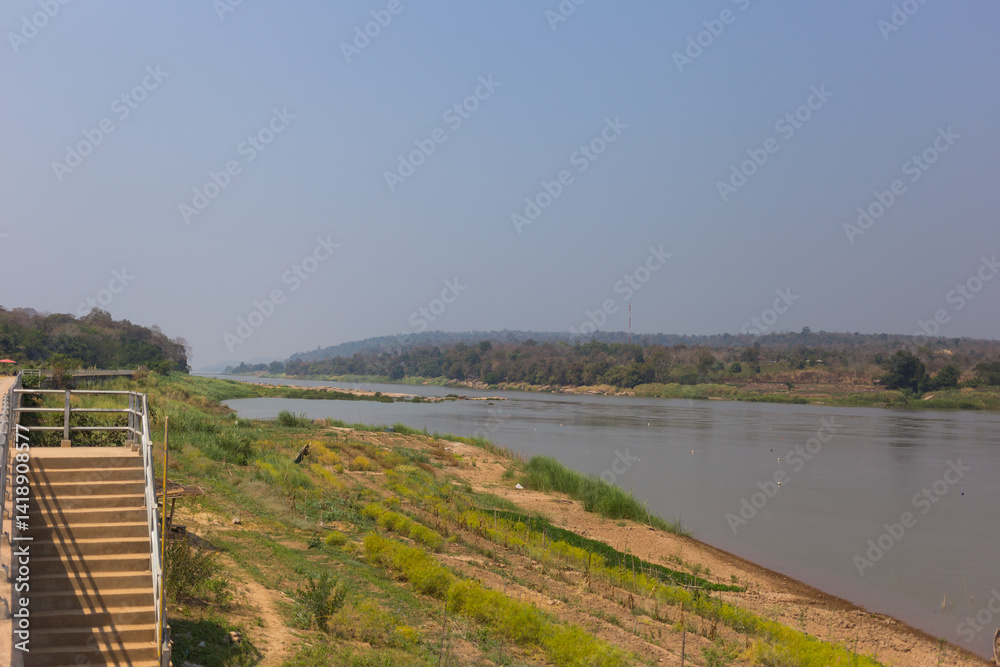 Fototapeta premium Exploring tranquil riverbanks scenic landscape nature photography serene environment peaceful viewpoint natural beauty