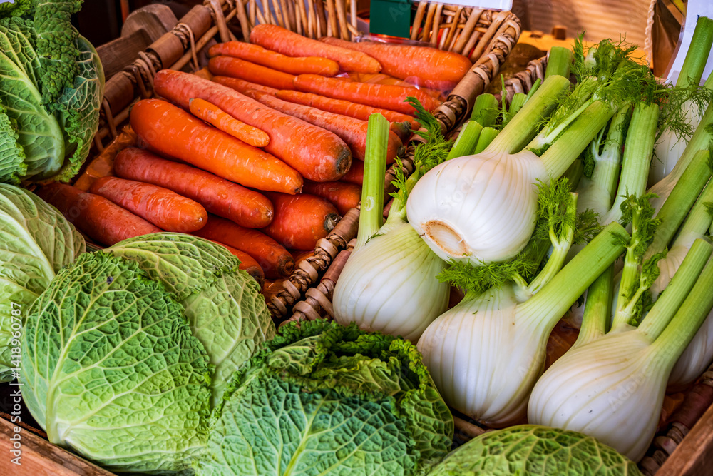 Freshly harvested vegetables displayed at a local market, showcasing vibrant colors and organic produce in early morning light