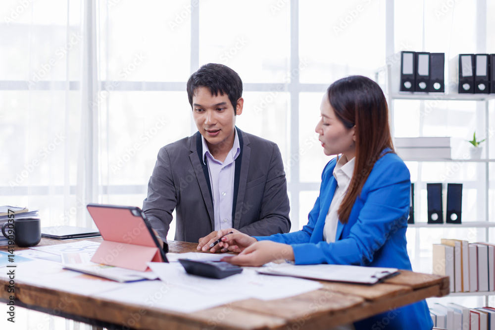 Team of Accounting business are calculating income-expenditure and analyzing real estate investment data on tablet computer, Financial and tax systems concept.
Team of Accounting business are calculating income-expenditure and analyzing real estate investment data on tablet computer, Financial and tax systems concept.