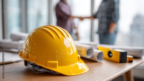 Construction workers reviewing blueprints (1) photo