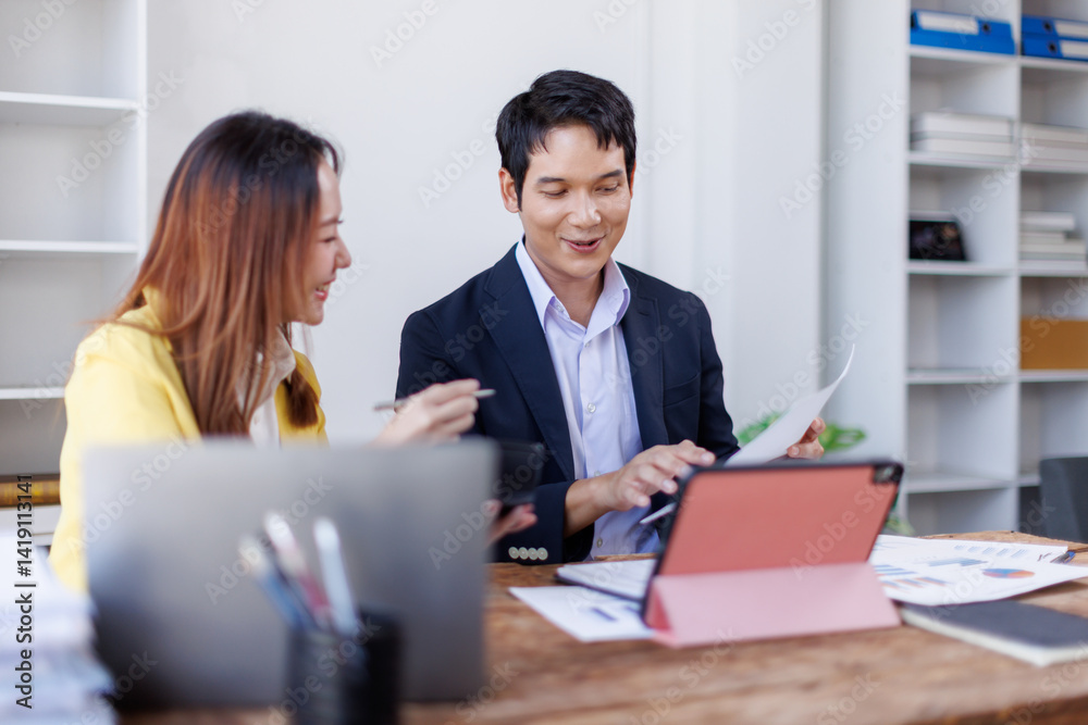 Financial Business team analyze the graph of the company's performance to create profits and growth, Market research reports and income statistics, Financial and Accounting concept.