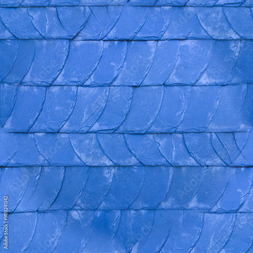 The old blue tile wall. Blue stone background. The texture of the tile. Brickwork. Seamless image.