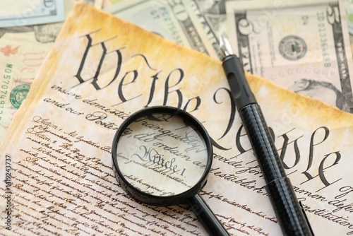 American USA Constitution paper page and magnifying glass close up