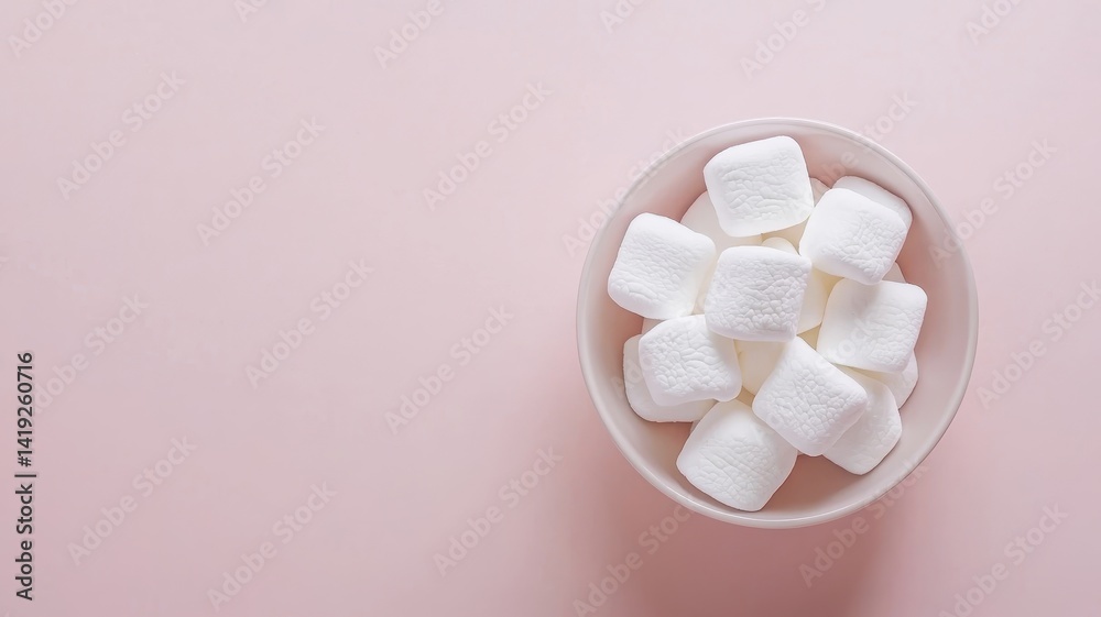 A bowl of minimal marshmallows, highlighting a candy theme in a clean aesthetic. A bowl of minimal marshmallows, highlighting a candy theme in a clean aesthetic.