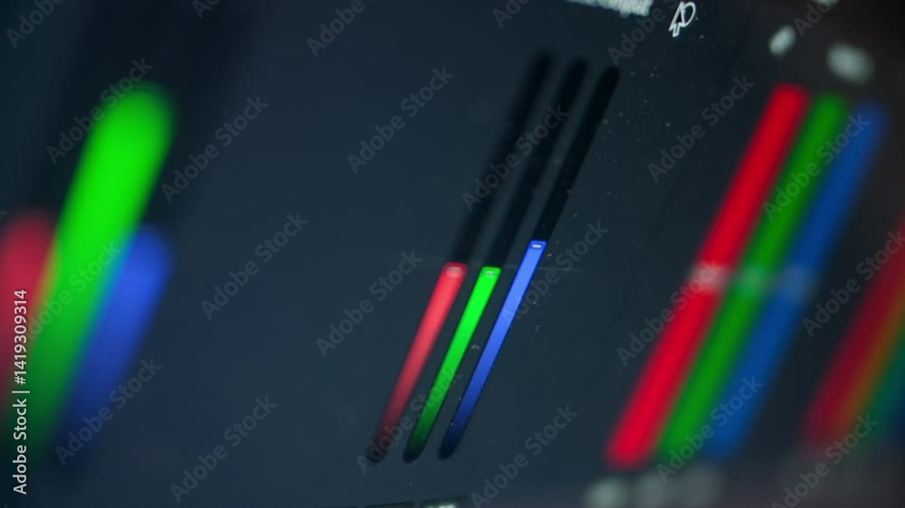 Close up: Color correction grading post production video in progress. Video editing software program. darkness, shadow, backlight. Macro shot of monitor screen. Color bar column