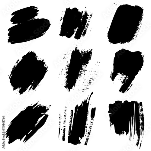 Black paint brush strokes arranged in a creative layout for art and design projects