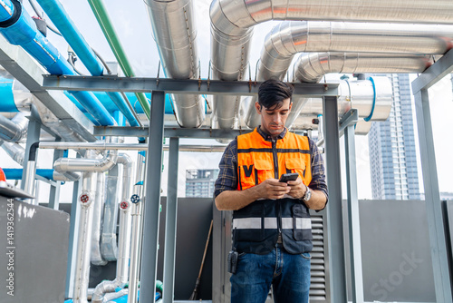 caucasian man, hands and phone in the city for construction planning, communication or social media on site. male contractor or engineer texting on smartphone while resting after working on rooftop