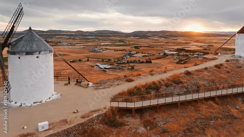 Aerial view of the windmills of Consuegra at sunset, Castilla-La Mancha, Spain.