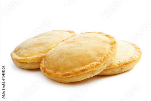 three pastries are sitting on a white surface