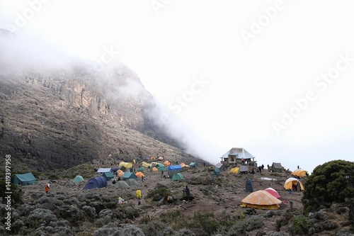Obraz na płótnie Misty scenery of Barranco Camp with tents on trail to Kilimanjaro Peak, Machame Route, Tanzania w salonie