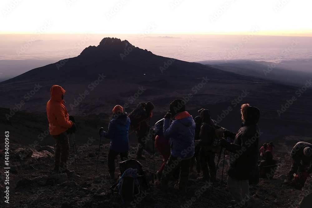Sunset scenery with Mawenzi Peak on horizon during climbing to Uhuru peak on Kibo volcano (Kilimanjaro) – 5895 m. Tanzania