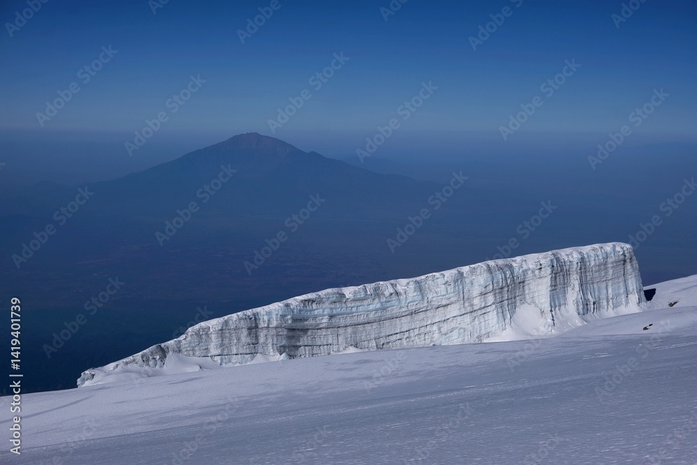 Uhuru peak on Kibo volcano (Kilimanjaro) – 5895 m with Mount Meru in background, Tanzania