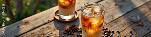 Refreshing iced coffee drinks on wooden table with sunlight and coffee beans