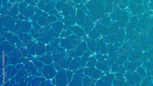 Water drop in swimming pool. Blue color. Ocean lockdown surface. Stop motion video. H2O hotel relax. Sea wave summer texture. Crystal wet waves. Float calm splash. Nobody liquid background
