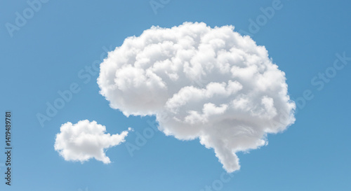 A cloud shaped like a brain with a smaller cloud next to it against a clear blue sky background view