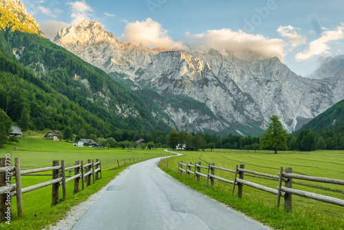 Obraz na płótnie Idyllic scene with a rural road in the Alpine landscape, Logar Valley, Slovenia w salonie