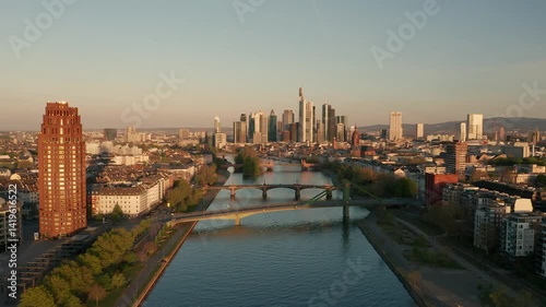 Stunning aerial view of Frankfurt's skyline and scenic river landscape during golden hour