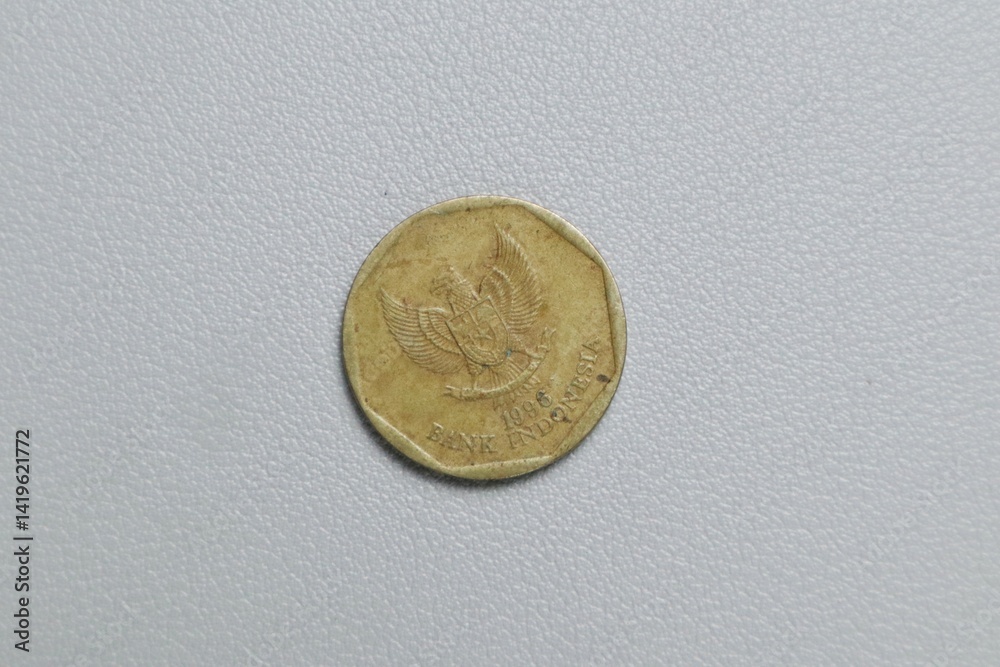 Indonesian gold rupiah metal coin money