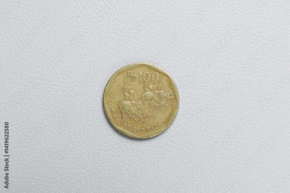 Indonesian gold rupiah metal coin money