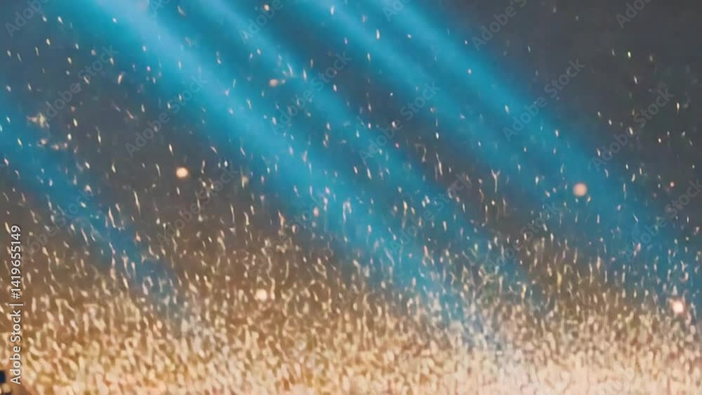 Golden Particles Rising with Blue Light Rays Abstract Motion Background