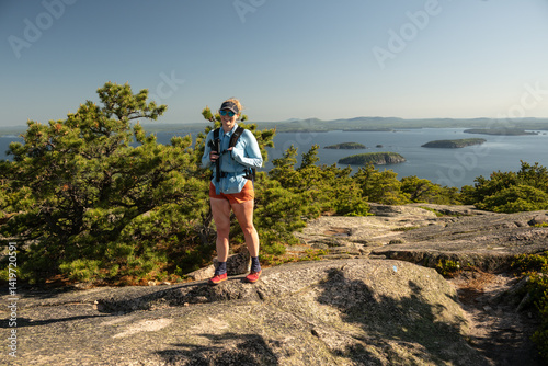 Obraz na płótnie Woman Smiles on Rocky Trail in Acadia w salonie