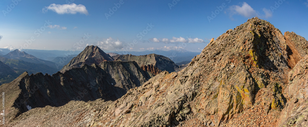 Obraz premium The summit of 13er San Miguel Peak (13,756') in the San Juan Range near Telluride Colorado. Directly behind is Grizzly Peak (13,753') and V10 (13,480').