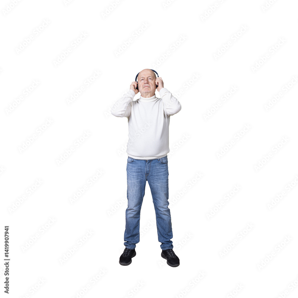 a man standing with a pair of headphones on his ears