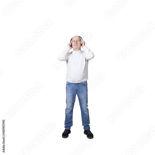 a man standing with a pair of headphones on his ears