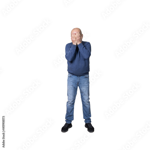a man with his hands covering his face