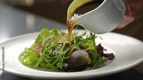 Japanese-style sesame dressing poured over fresh gre