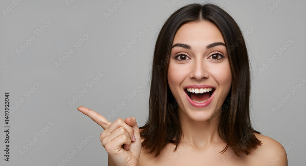 A cheerful woman with a bright smile pointing to the side, capturing attention and excitement. A cheerful woman with a bright smile pointing to the side, capturing attention and excitement.