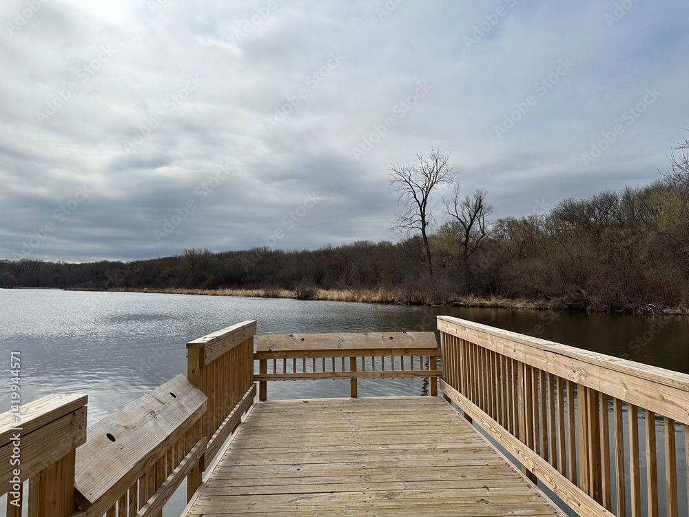 Naklejka premium wooden bridge over lake
