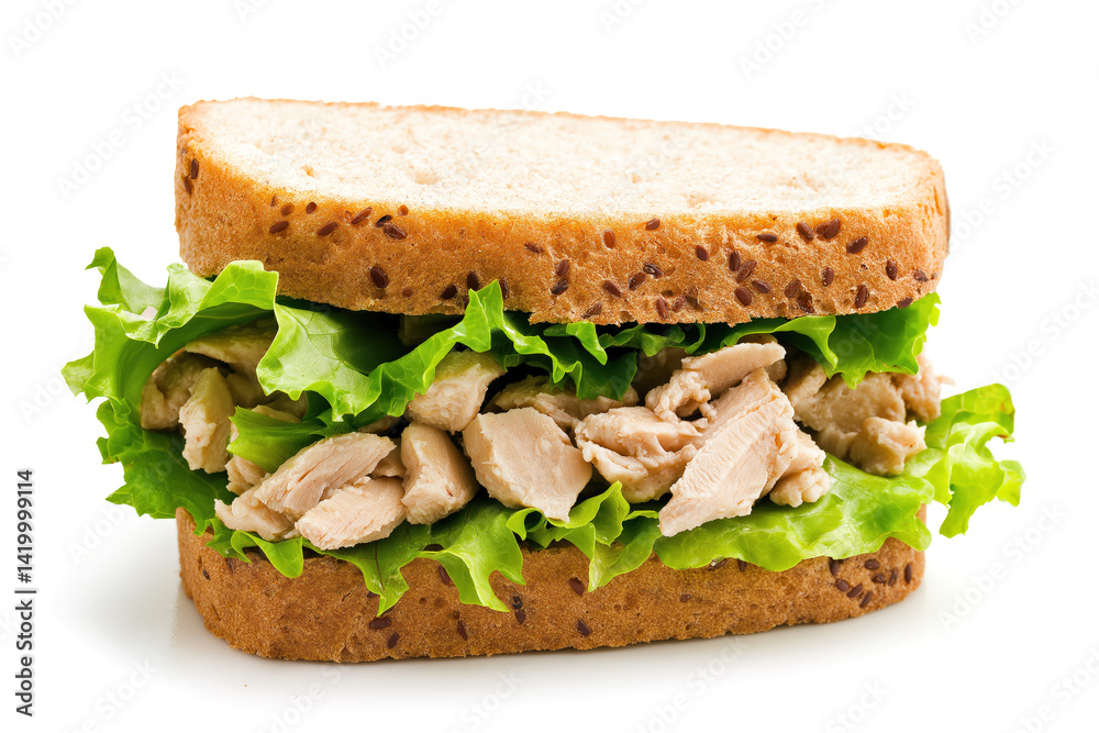 Tuna sandwich with leafy greens and grain bread, stacked fresh and cleanly presented isolated on a white background Tuna sandwich with leafy greens and grain bread, stacked fresh and cleanly presented isolated on a white background