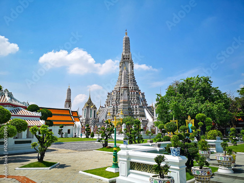 Wat Arun in Bangkok on a sunny day with blue sky, Wat Arun view from behind
