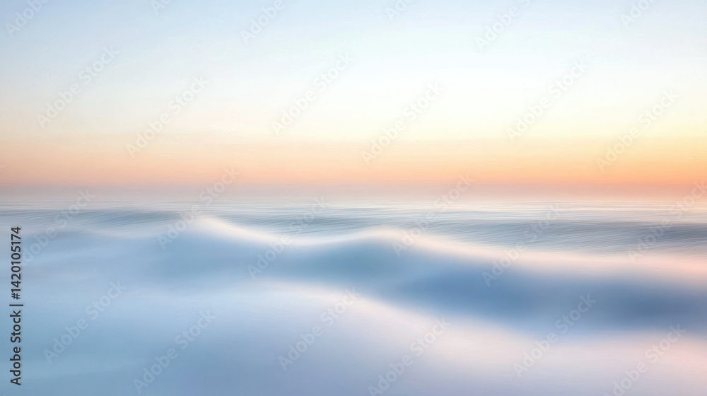 The ocean waves gently blend with the sky at sunset The ocean waves gently blend with the sky at sunset
