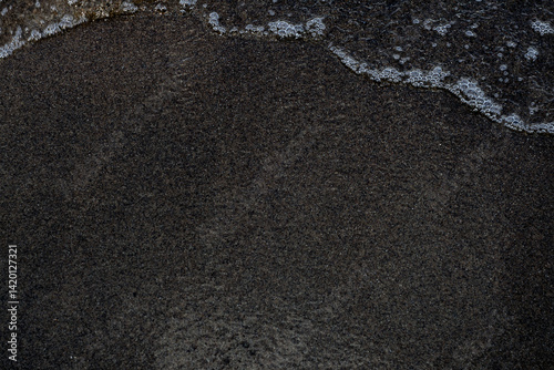 Dark Sand at Beach