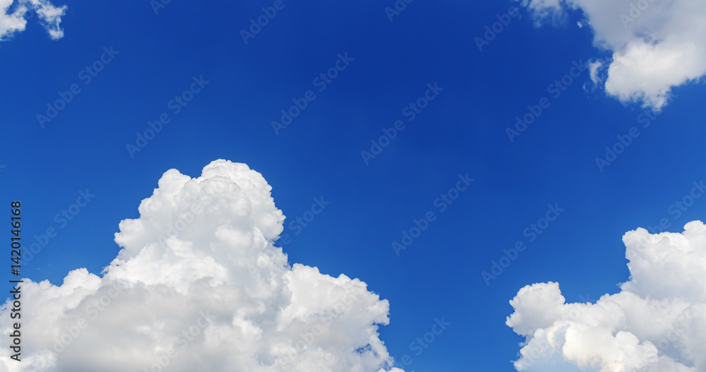 Naklejka premium White clouds in the blue sky