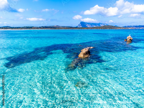 Rocks and turquoise water in Lu Impostu beach
