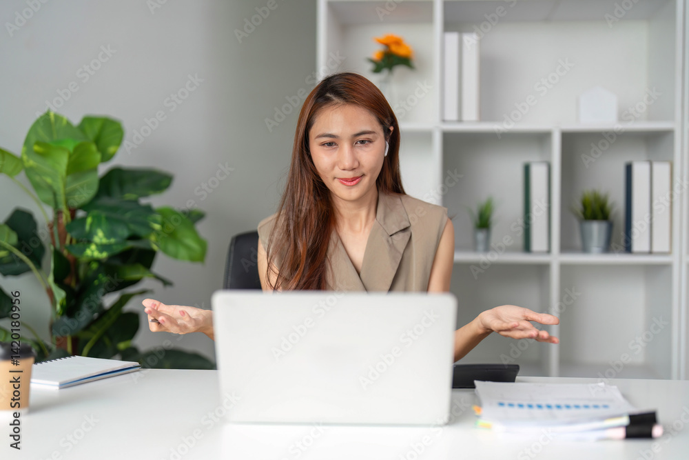 Remote Work and Online Collaboration. A woman engaged in a virtual meeting, discussing project details with enthusiasm. Remote Work and Online Collaboration. A woman engaged in a virtual meeting, discussing project details with enthusiasm.