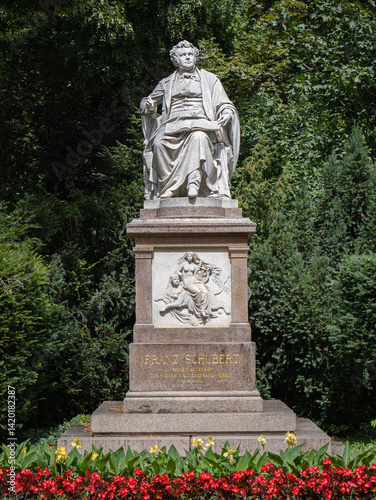 Franz Schubert's Majestic Statue Amidst Lush Greenery in Vienna's Stadtpark, Austria