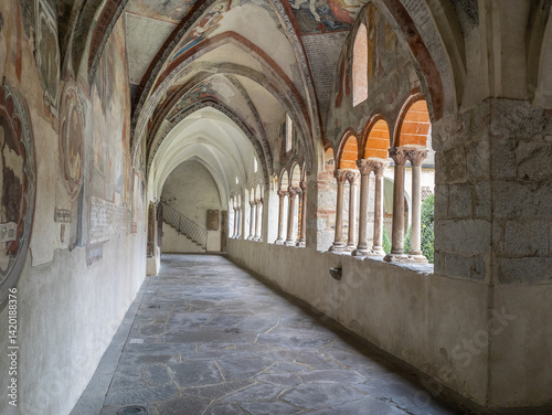 Historic Gothic Cloister Featuring Intricate Murals, Stone Arches and Frescoed Ceiling, Bressanone - Italy