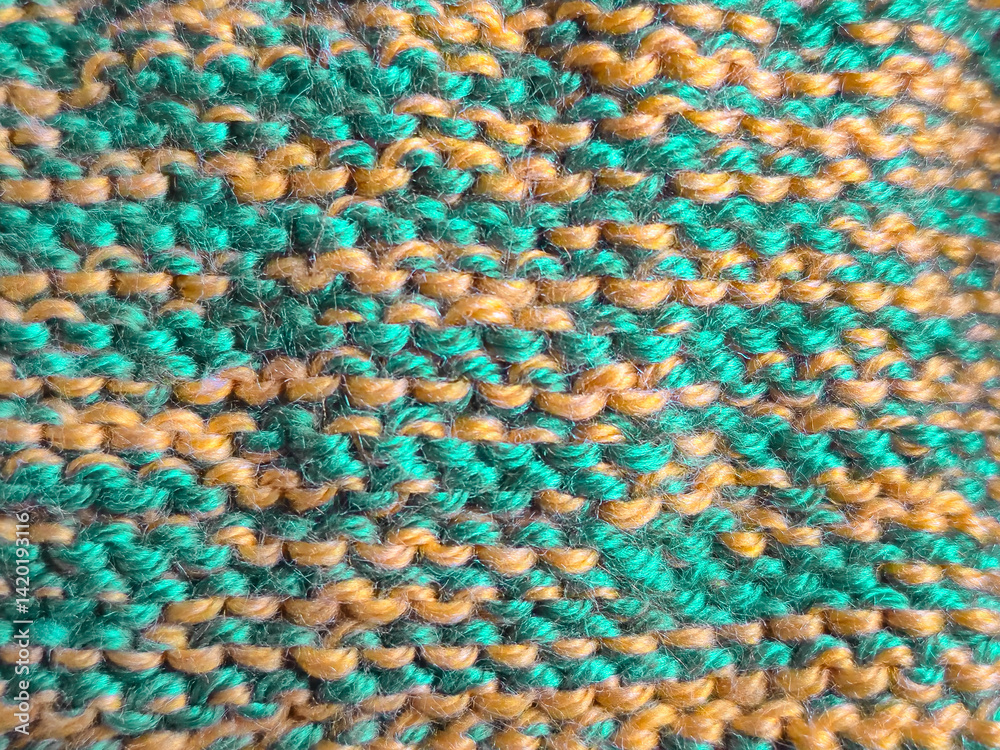 This is a Colorful and Vibrant Knitted Fabric Design featuring Green and Yellow Patterns This is a Colorful and Vibrant Knitted Fabric Design featuring Green and Yellow Patterns