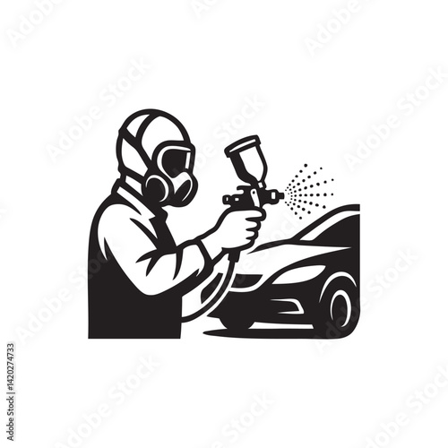 silhouette of a man spray painting car