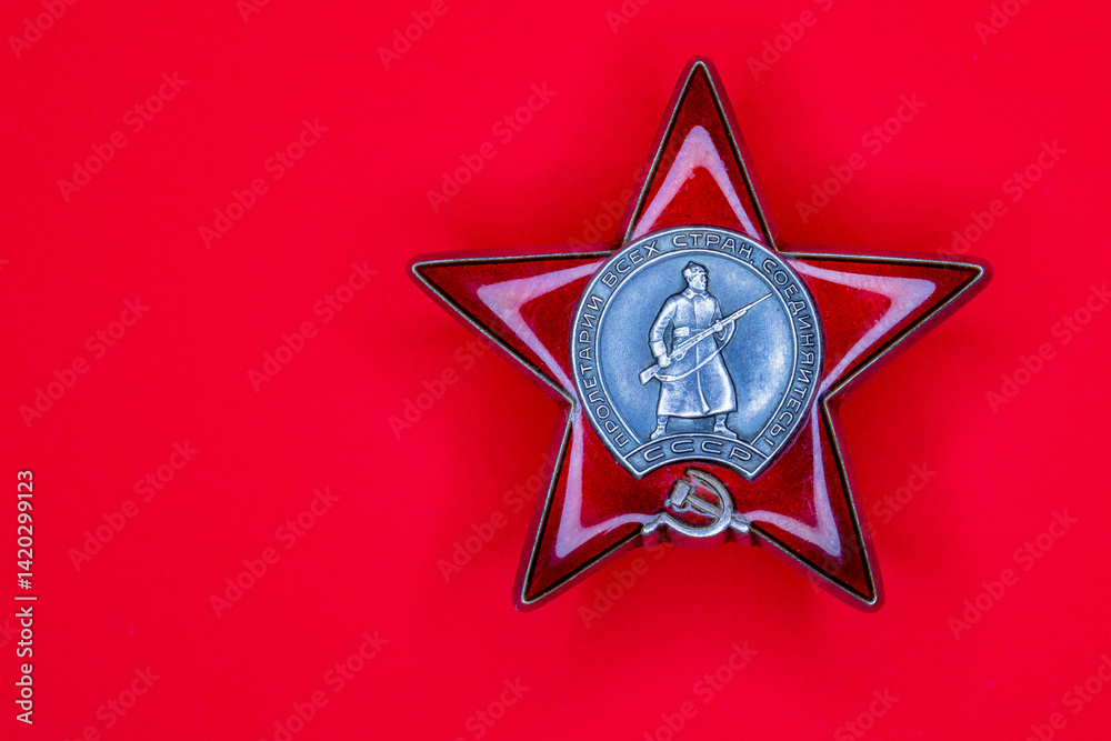 Naklejka premium Order of the Red Star - A model of the Order of the USSR. May 9 Victory Day. Translation of Russian inscriptions: Proletarians of all countries, unite!, USSR
