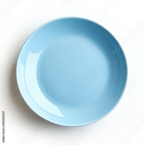 A light blue ceramic plate centered on a plain white background studio shot