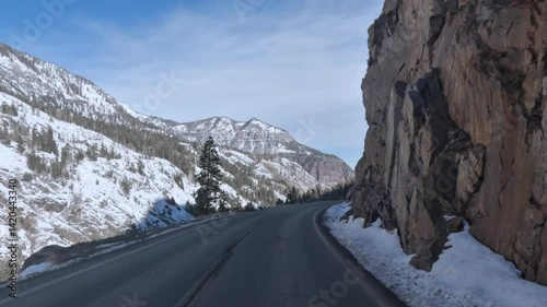 POV road trip along the Million Dollar Highway in winter through Colorado mountains 